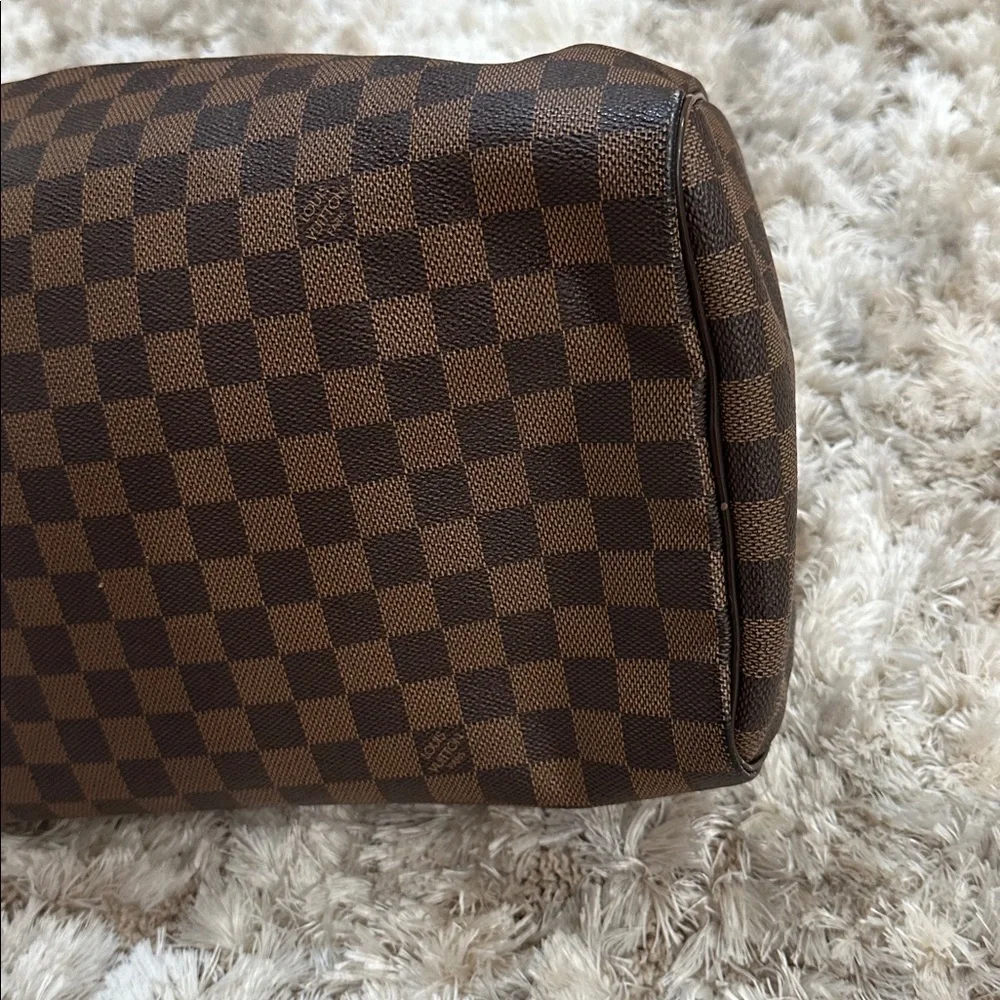 Louis Vuitton
Damier Ebene Speedy 35 - Picture 9 of 11